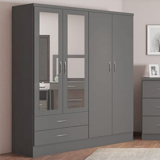 ChoiceWardrobe Modara Grey 4 Door Mirrored Wardrobe in Modern Bedroom Setting with Drawers and Hanging Rail