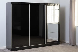 ChoiceWardrobe Modora Black Gloss 3 Door Sliding Wardrobe with Mirror styled in modern bedroom interior