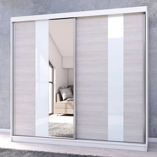 The CHOICEWARDROBE Monaro 233cm Sliding Wardrobe features a matt white frame, mirror door, and gloss white and light oak panels—an elegant modern piece that reflects the room’s brightness.