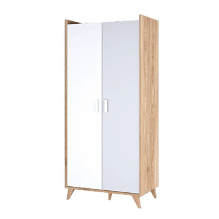 The CHOICEWARDROBE Muncie 2 Door Wardrobe features a Scandinavian style with white and oak effect, minimalistic design, and tapered legs. At 85cm wide, it’s ideal for modern bedrooms.