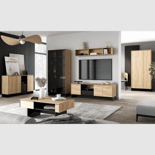 A modern living room with light wood and black furniture, including a coffee table, TV stand, display cabinet, sideboard, wall shelves, and the CHOICEWARDROBE Narva 2 Door Wardrobe in Mountain Ash. Neutral décor and a large rug complete the space.