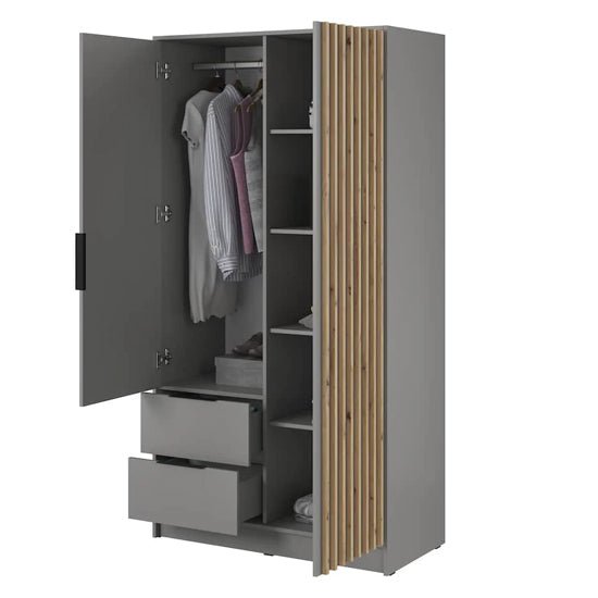 Grey 2-door wardrobe open to show hanging clothes, shelves with folded garments, and two drawers. Features oak slatted design accent.