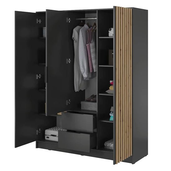 Graphite 3 door hinged wardrobe with oak slat design, drawers, shelves, and hanging rail.