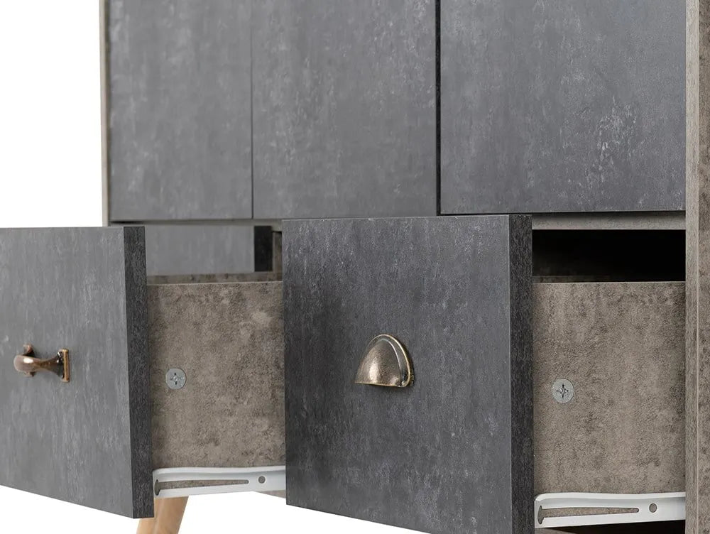 CHOICEWARDROBE Noein 3 drawer wardrobe detail: open grey concrete effect drawers with metal handles and wooden legs.