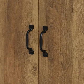 Close-up of the black metal handles on the CHOICEWARDROBE Nolan Knotty Oak 3 Door Wardrobe, showcasing its rustic wooden design and natural wood grain for a farmhouse industrial look.