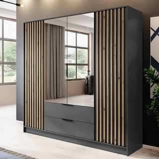 The CHOICEWARDROBE Norco 4 Door Mirrored Wardrobe, 206 cm in anthracite grey with natural oak slat panels and drawers, brings a modern industrial touch to any room with its sleek mirrored doors and contemporary design.