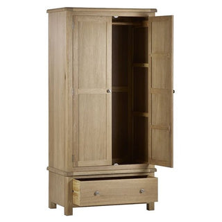 The CHOICEWARDROBE Norland Limed Oak 2 Door Wardrobe showcases a classic farmhouse style with a hanging rail, interior shelving, and a spacious lower drawer. Its timeless limed oak finish blends elegance and practicality for your home.