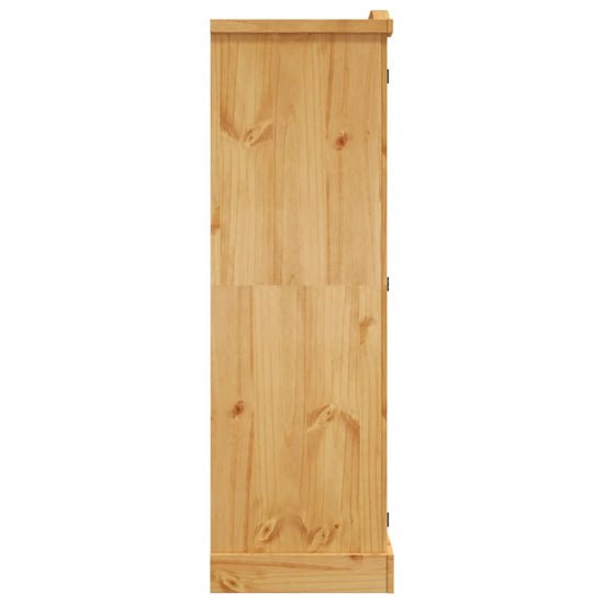 Side view of a 3-door pine wardrobe with natural finish and black metal hinges.