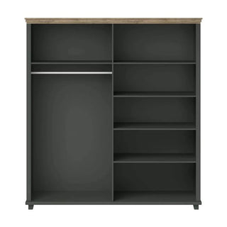 Left interior of ChoiceWardrobe Norrin Deep Green Wardrobe featuring hanging rail and open shelf compartments