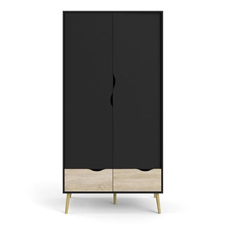 The CHOICEWARDROBE Nuvell Black & Oak 2 Door Wardrobe with Drawers features a modern minimalist design, two doors, two light wood drawers at the bottom, and four slanted legs for sleek storage in any room.