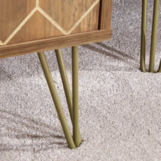 The image shows part of the CHOICEWARDROBE Orlana 2 Door Wardrobe in mango wood effect with brass legs and geometric detailing, standing on a light gray carpet, highlighting its modern storage design.