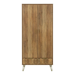 The CHOICEWARDROBE Orlana 2 Door Wardrobe features a mango wood effect, brass legs, and geometric detailing—ideal for stylish modern bedroom storage.