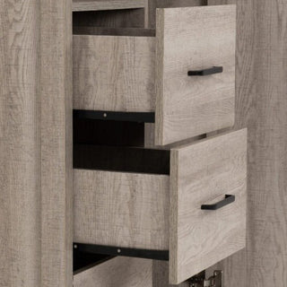 A close-up shows two open wooden drawers with black handles on the CHOICEWARDROBE Oxnard 80cm Single Door Wardrobe in light oak. The empty drawers are partially pulled out, displaying their interiors and metal slides.