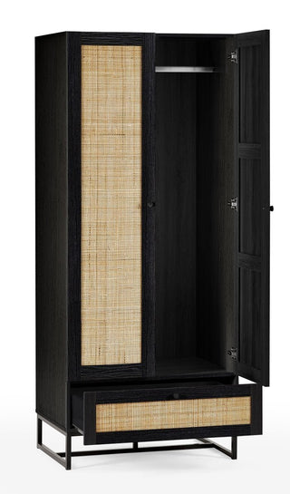 The CHOICEWARDROBE Padstow Black Rattan Wardrobe features two doors and one drawer, with woven rattan panels for a modern boho look. One door is open to show the hanging rod inside; the lower drawer is partially pulled open. Width: 80cm.