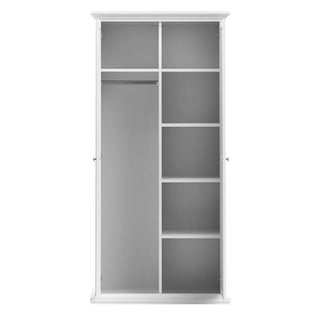 The CHOICEWARDROBE Paroya 96cm 2 Door Wooden Wardrobe in white features shelving, a timeless paneled design, and practical bedroom storage in a simple, modern style.