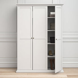 The CHOICEWARDROBE Paroya Wooden Triple Door Wardrobe in white features an elegant panelled design, shelves with folded clothes, boxes, and shoes visible behind a partially open door—perfect bedroom storage.