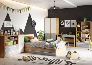A modern children’s bedroom with the CHOICEWARDROBE Peoria Sonoma Oak & White Small Double Bed (EU 120cm) featuring storage drawers, plus wardrobe, desk, shelves, toys, mountain wall art, bunting, framed prints & a clock. Furniture in wood and grey Sonoma Oak.