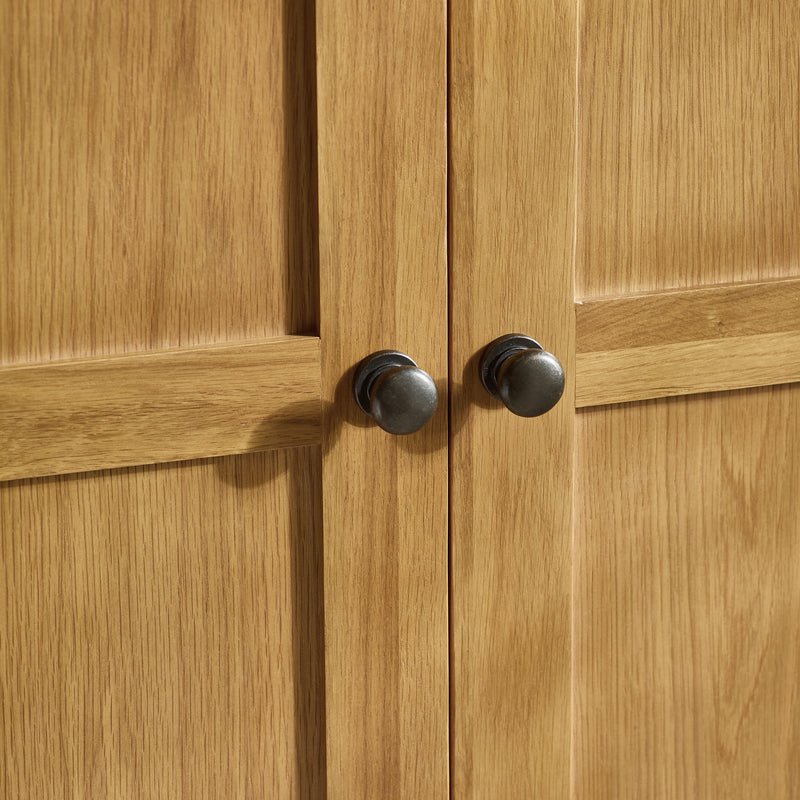 CHOICEWARDROBE Porsha 142cm 3-door waxed oak wardrobe with dark metal knobs.