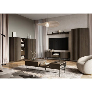 A modern living room features a large wall-mounted TV, dark wood cabinets, a CHOICEWARDROBE Prato 92cm 2 Door Wooden Wardrobe in Portland Ash finish, coffee table, light rug, round armchair, and sheer curtains for a sleek neutral look.