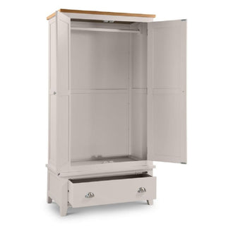 Interior view of the CHOICEWARDROBE Raisie 97cm Wardrobe showing hanging rail and lower storage drawer in grey & oak finish