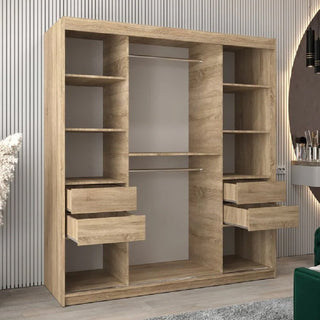 The CHOICEWARDROBE Reston 2 Door Sliding Mirrored Wardrobe in 180cm Sonoma Oak finish, featuring drawers and shelving with a modern horizontal panel design, stands against a grooved wall in a contemporary room.