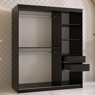 The CHOICEWARDROBE Rieti 2 Door Mirrored Sliding Wardrobe (150cm, Matt Black) features a modern panelled design with gold handles, full-length mirror, two hanging rods, four open shelves, and two drawers. A white quilted wall forms the backdrop.