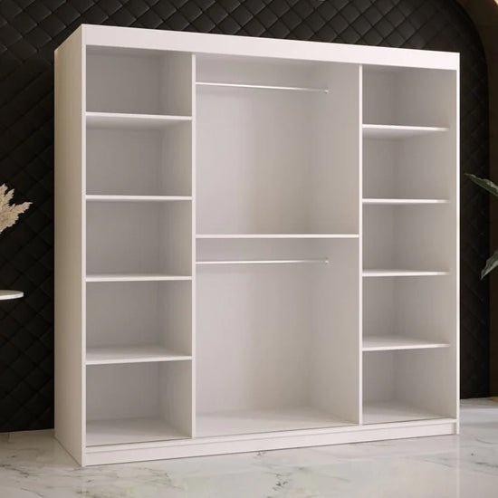 White two-door sliding wardrobe with a mirrored door and visible internal shelving.