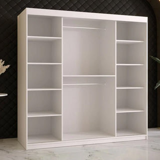 The CHOICEWARDROBE Rieti 2 Door Mirrored Sliding Wardrobe in a 180cm matt white finish features a modern panelled design, gold handles, and ample internal storage shelves—an elegant, space-saving bedroom solution.