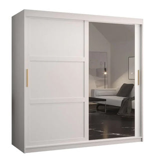 The CHOICEWARDROBE Rieti 2 Door Mirrored Sliding Wardrobe (180cm, matt white, gold handles) is a modern space-saving piece with full-length mirror doors and shelves, adding style and function to any minimalistic bedroom.