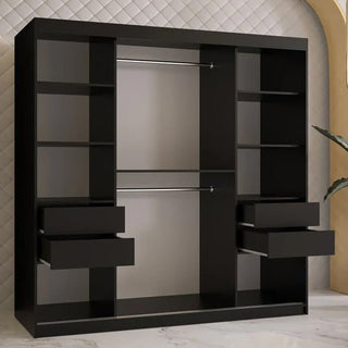 The CHOICEWARDROBE Rieti 2 Door Sliding Wardrobe in mocha brown with gold handles, shelves, and drawers stands on a marble floor against a quilted-pattern wall, with a plant partially visible on the right.