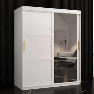 The CHOICEWARDROBE Rieti II Mirrored Wardrobe features 2 sliding doors—one solid white, one mirrored—standing against a black wall with vertical lines, reflecting a modern living room with a sofa and floor lamp.