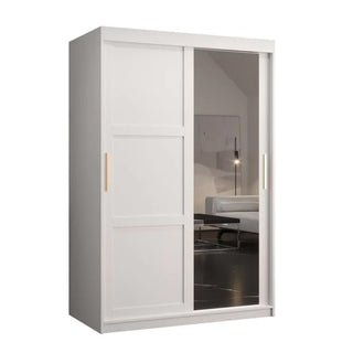The CHOICEWARDROBE Rieti Mirrored 2 Door Sliding Wardrobe in a white finish features a full-length mirror, gold handles, and modern panel design. One door is mirrored, reflecting a stylish room with minimal décor. Spacious storage inside.