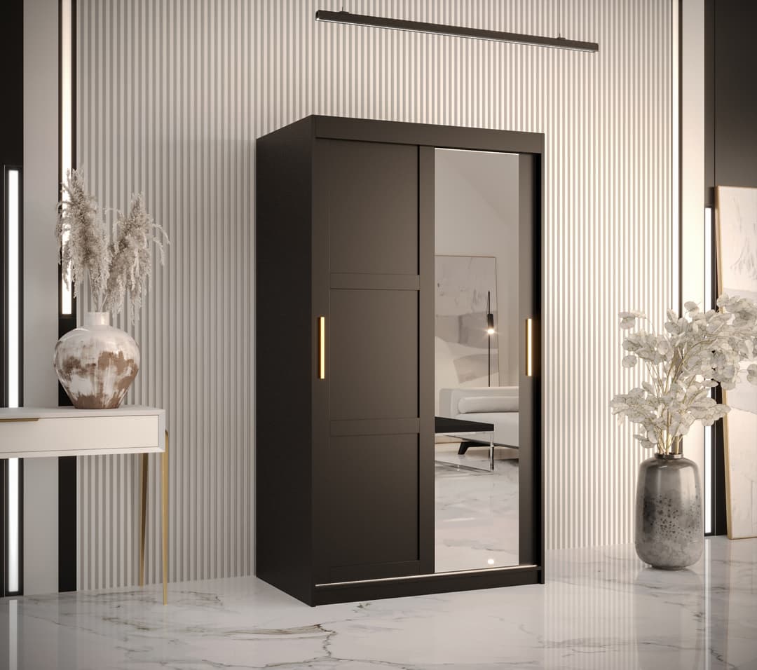 Black sliding door wardrobe with one mirrored door and gold handles