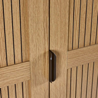 Close-up of the CHOICEWARDROBE Sarnia Natural Oak 2 Door Wardrobe, featuring slatted wood doors, a modern central handle, and Japandi-inspired design with metal legs in a natural oak finish.