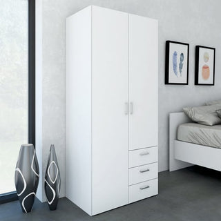 The CHOICEWARDROBE Scalia 2 Door 3 Drawer Wardrobe (76 cm, white matt finish, silver handles) stands by the bed. Two decorative vases rest nearby, framed artwork hangs above the bed, and a large window is visible on the left.