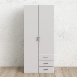 The CHOICEWARDROBE Scalia 2 Door 3 Drawer Wardrobe, 76 cm in white matt finish with silver handles, stands against a white textured wall on a wooden floor, offering compact modern bedroom storage.