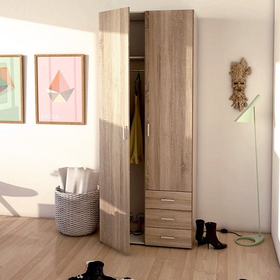 Modern oak finish two-door, three-drawer wardrobe, partly open showing hanging rail.