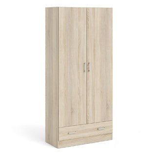 The CHOICEWARDROBE Scalia 2 Door Wooden Wardrobe in Sonoma Oak Finish offers compact bedroom storage with shelves and a spacious bottom drawer, combining modern style and functionality.