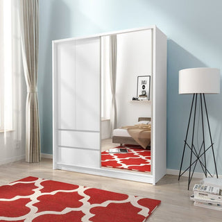 A modern bedroom with a CHOICEWARDROBE Sedona 154cm Wooden Mirrored Sliding Door Wardrobe in matt white, light blue walls, a red patterned rug, floor lamp, and bed reflected for sleek contemporary storage and style.