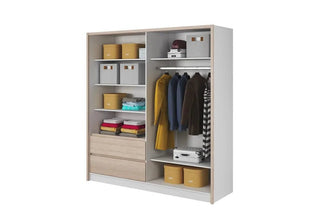 The CHOICEWARDROBE Serano 2 Door Sliding Wardrobe in Sonoma Oak features open shelves, hanging space, two drawers, and ample organized storage—ideal for clothes, jackets, shirts, boxes, and bins in any modern bedroom.