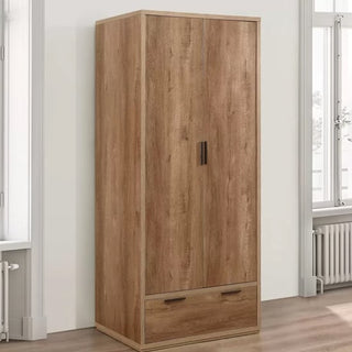 The CHOICEWARDROBE Stock 80cm 2 Door 1 Drawer Wooden Wardrobe in rustic oak finish offers compact, modern bedroom storage with two vertical doors, dark handles, and a bottom drawer, standing stylishly against a white wall.