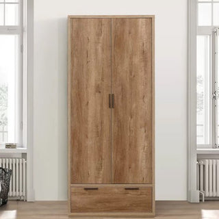 The CHOICEWARDROBE Stock 80cm 2 Door 1 Drawer Wooden Wardrobe in rustic oak finish offers compact, modern bedroom storage and fits stylishly between two windows against a light wall.