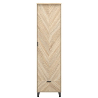 The CHOICEWARDROBE Stockholm 1 Door Wooden Wardrobe features a modern chevron-patterned door, small bottom drawer, closed design, four black legs, and a 50cm natural oak finish for Scandinavian elegance.