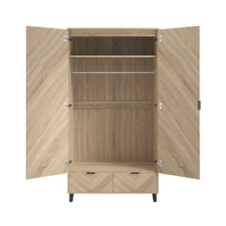 The CHOICEWARDROBE Stockholm 100cm Chevron-Design Wardrobe features two open doors revealing an upper shelf, hanging rod, spacious main space, and two lower drawers in Sonoma Oak with sleek black legs.
