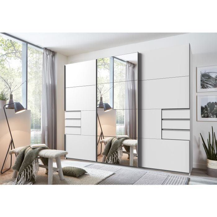 Modern bedroom with a CHOICEWARDROBE Sylven Sliding Mirrored Wardrobe (3 Door, White Finish, 270 cm wide mirror doors), a woven rug, bench, floor lamp, sheer curtains, framed pictures on the wall, and windows overlooking greenery.