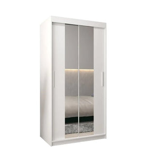 The CHOICEWARDROBE Tavira 100cm White Mirrored Sliding Door Wardrobe features a compact modern design with smooth glide doors and internal shelves, ideal for stylish space-saving while reflecting your room’s decor.