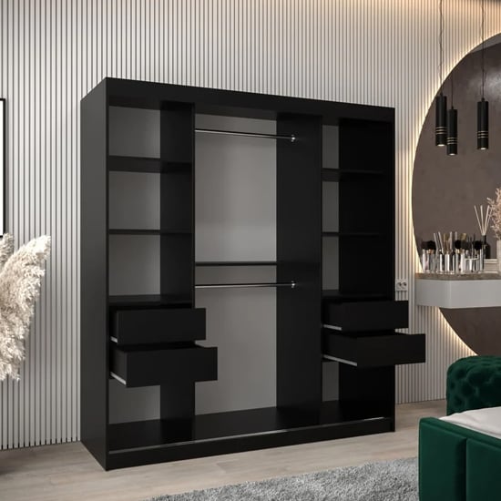 Black sliding door wardrobe with open drawers and shelves, modern design.