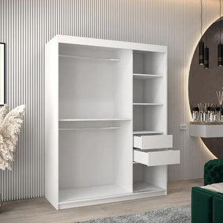 The CHOICEWARDROBE Tavira 2 Door Sliding Mirrored Wardrobe (150 cm, white finish) features a modern design with shelves and hanging space, shown in a stylish room with vertical striped walls and contemporary decor.
