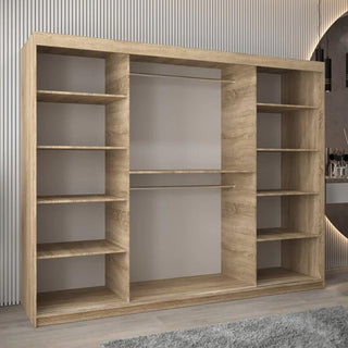 The CHOICEWARDROBE Tavira 3 Door Sliding Mirrored Wardrobe in oak finish, 250cm wide, features full-length mirrors, smooth sliding doors, and premium storage space with open shelves and two metal hanging rods.