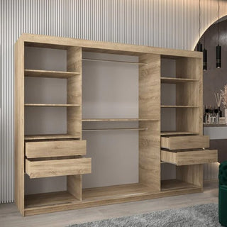 A spacious CHOICEWARDROBE Tavira 3 Door Sliding Mirrored Wardrobe in oak with full-length mirrors, smooth sliding doors, and premium storage stands in a modern room with vertical wall panels, a gray rug, and pendant lights.